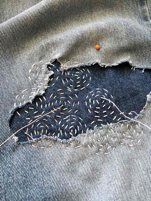 decorative mending on denim