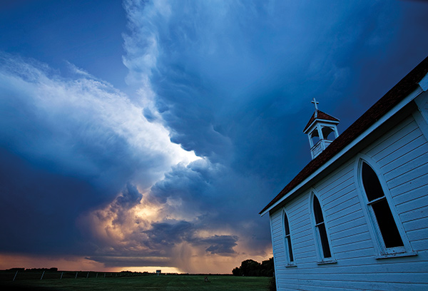 Storm clouds over a Saskatchewan country church
