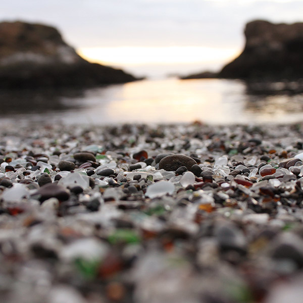 colorful pebbles by water