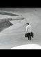 man with bags on a road