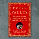 red book cover with a small picture of a hand playing piano