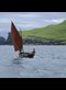 sailboat by an island
