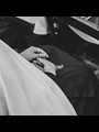 hands in a lap doing the rosary
