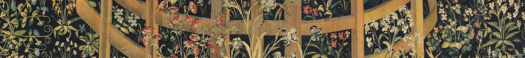 tapestry of flowers surrounding a fence