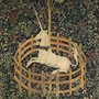 tapestry of a unicorn enclosed by a fence