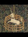 tapestry of a unicorn enclosed by a fence