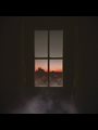 dark room with a big window