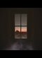 dark room with a big window