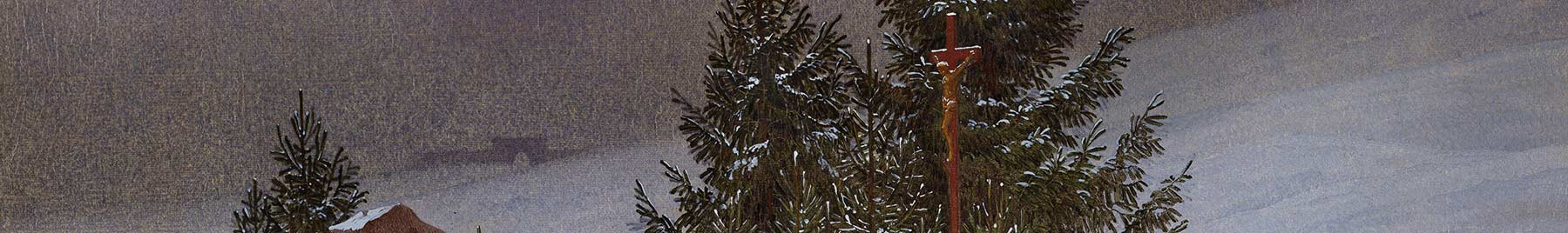 crucifix by a pine tree