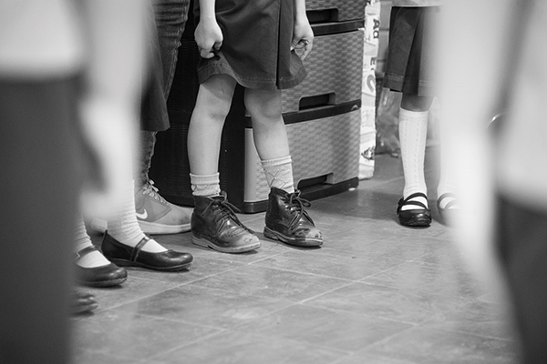 school girls standing in a hall