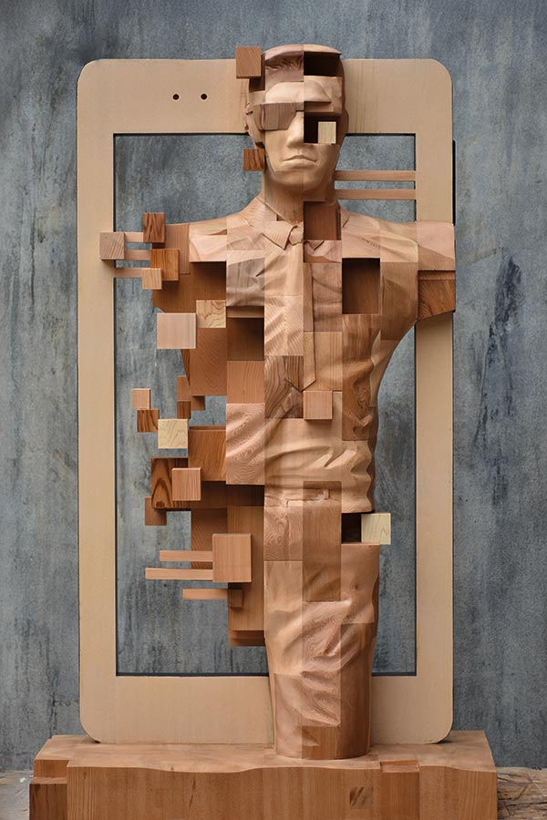 wood sculpture of a man