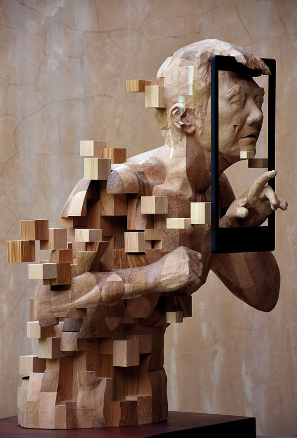 wood sculpture of a man