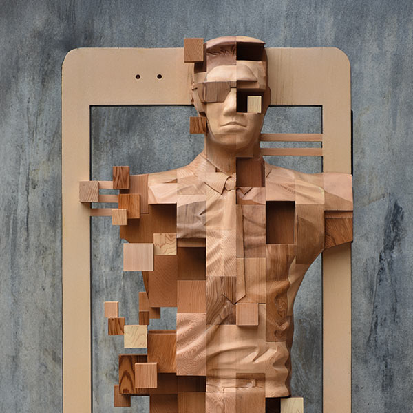 wood sculpture of a man