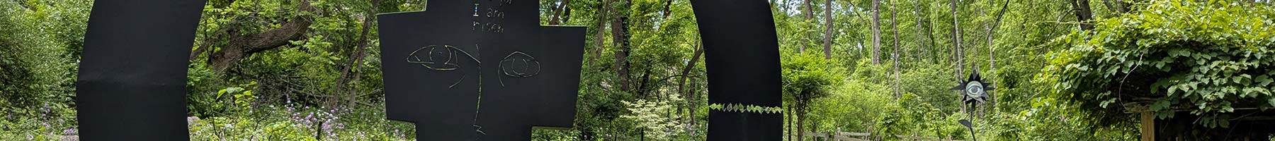 metal sculpture in a garden