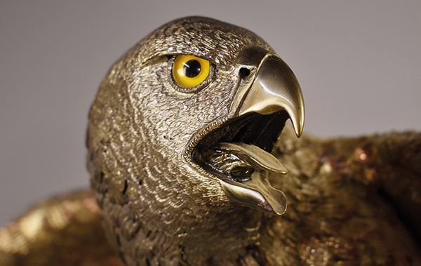 stainless steel sculpture of a hawk