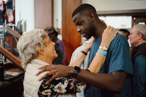 people embracing at the Asbury Revival